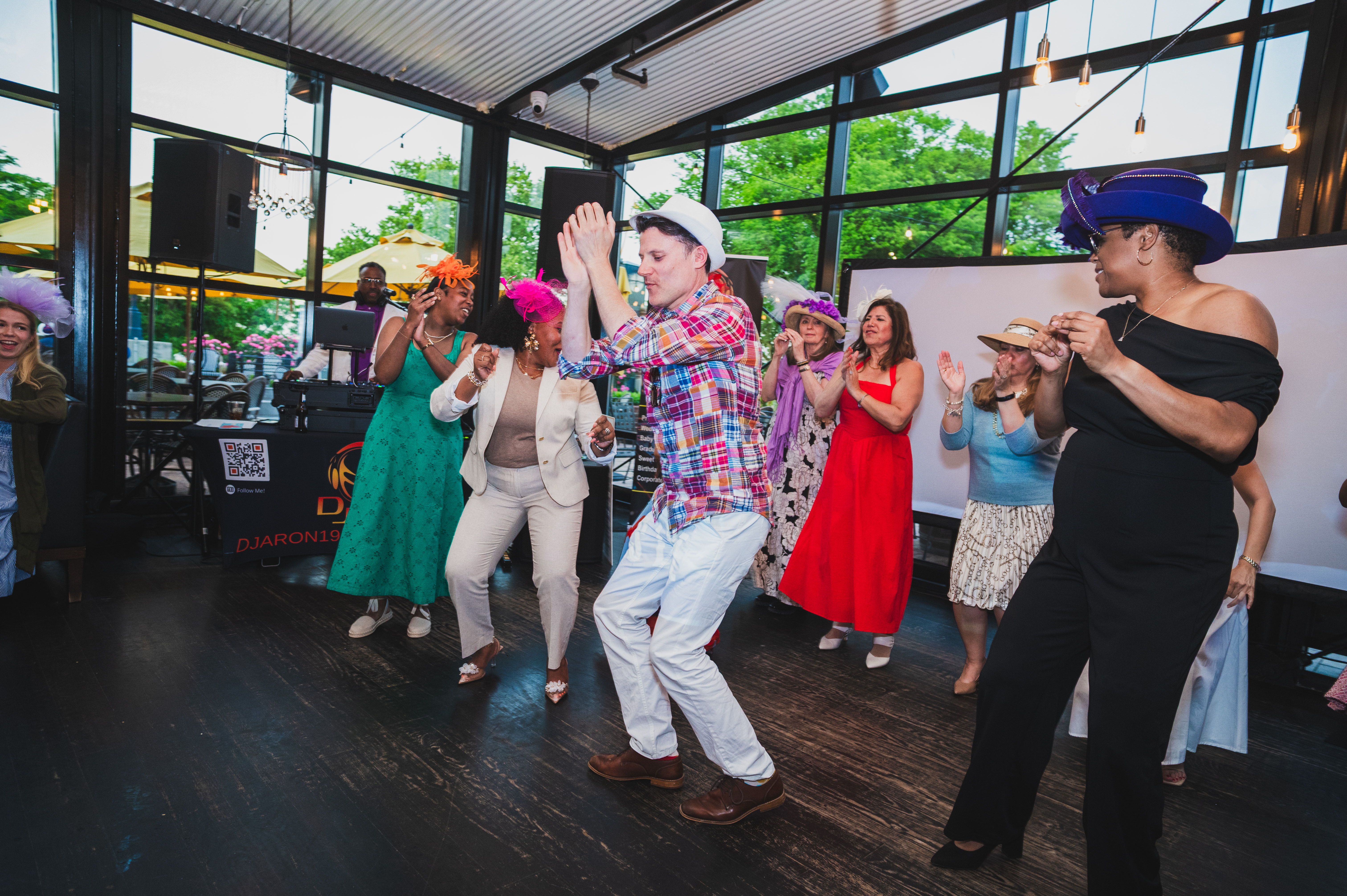 Guests joining the dance floor at a lively event