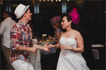 Jeff leading guests onto the dance floor at an event